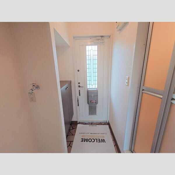 リバーマウンテンシティー205号室 玄関