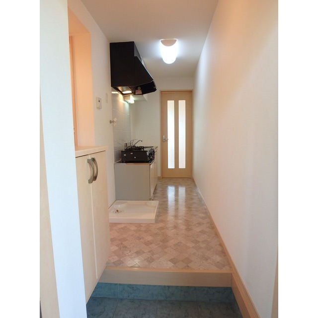 アンモードイグサ１105号室 玄関・キッチン