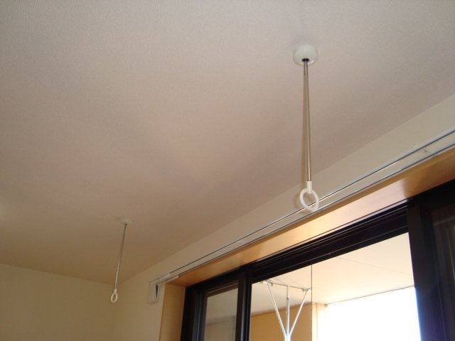 アメニティ　ヒルズ203号室 室内物干し