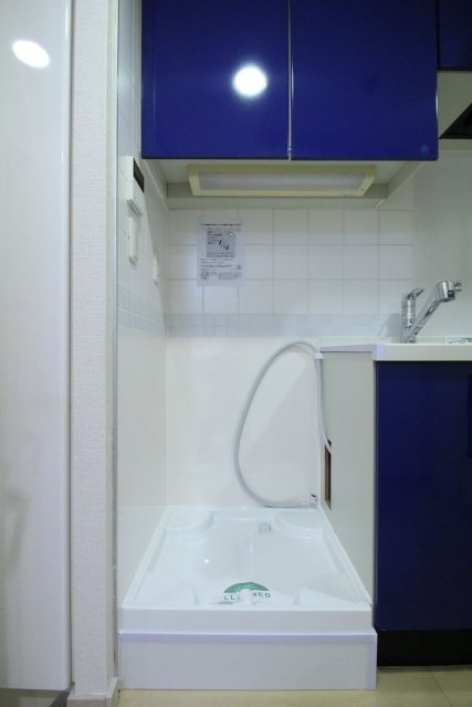 グランスイート月島リエール1階 室内洗濯機置場