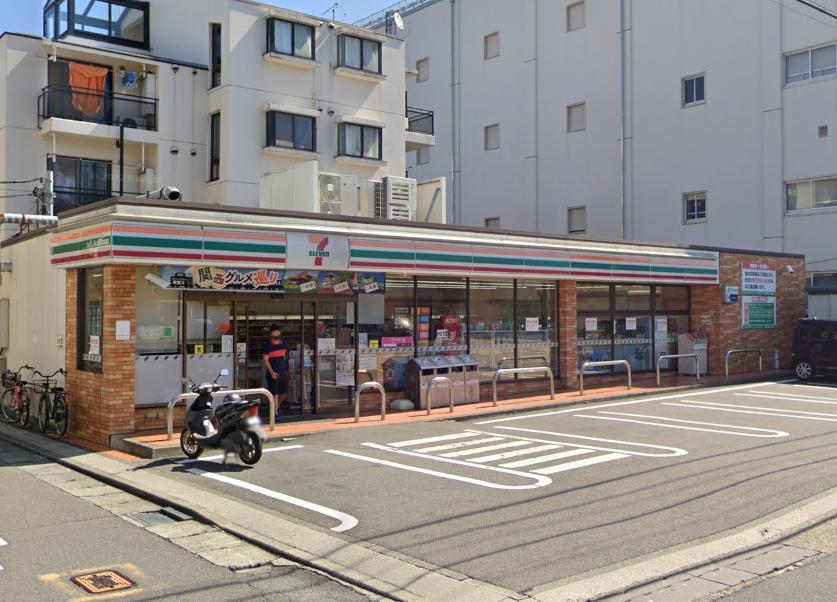 川崎市高津区千年アパート 【コンビニエンスストア】セブンイレブン 川崎子母口店まで1073ｍ