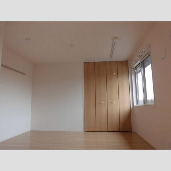 サザンハート吉岡　A棟203号室 洋室