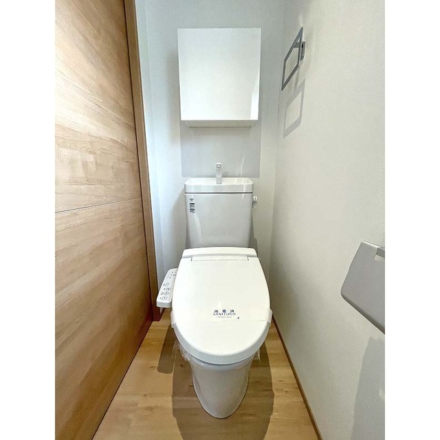 T.N. ガレージハウスA-2-101号室 温水洗浄便座