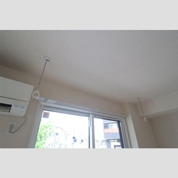 ヴァン・ヴェールおおたかの森　Ⅱ103号室 室内物干し