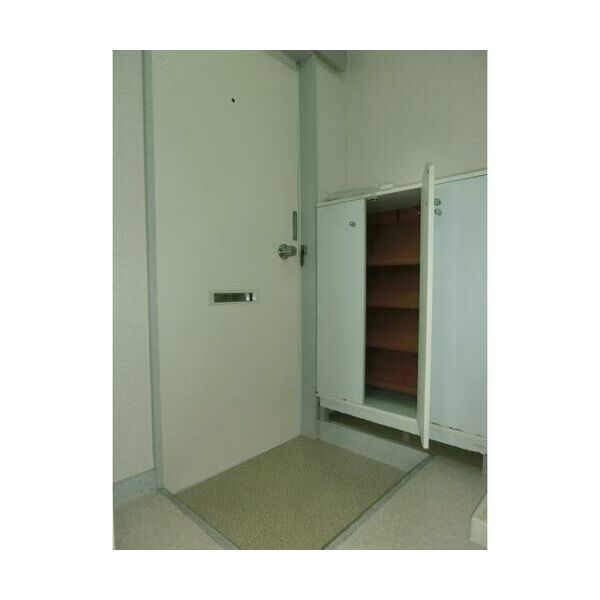 コスモ六実東203号室 玄関