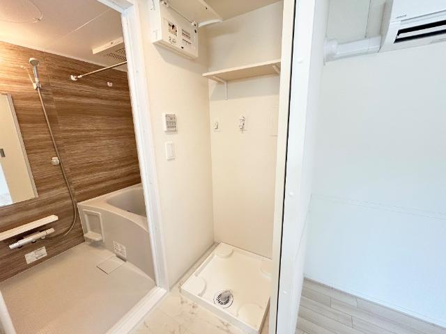 charme・toit（シャルム・トワ）206号室 洗濯機置場