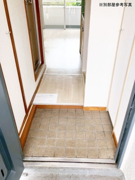 オレンジコート日野103号室 玄関