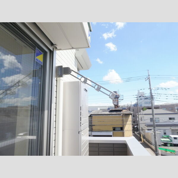 ベルクレスト302号室 物干し竿ホルダー