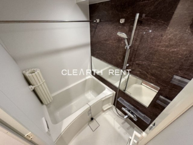 プラシア蒲田 ＴＨＥ ＧＲＡＮＤ ＲＥＳＩＤＥＮＣＥ5階 乾燥機付きのバスルーム