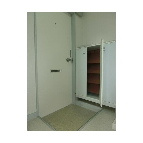 コスモ六実東203号室 玄関