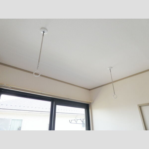 ナチュラルハウス　A201号室 室内物干し竿ホルダー