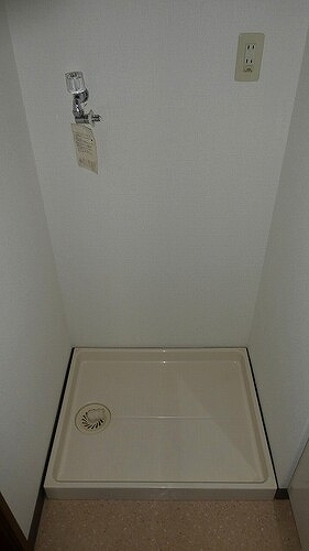 ライオンズステーションプラザ相模大野7階 室内洗濯機置場　※前回募集時2019年4月の写真