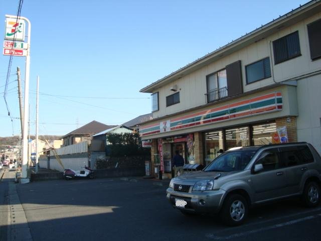 コンフィード セブンイレブン日野平山6丁目店まで1,231ｍ