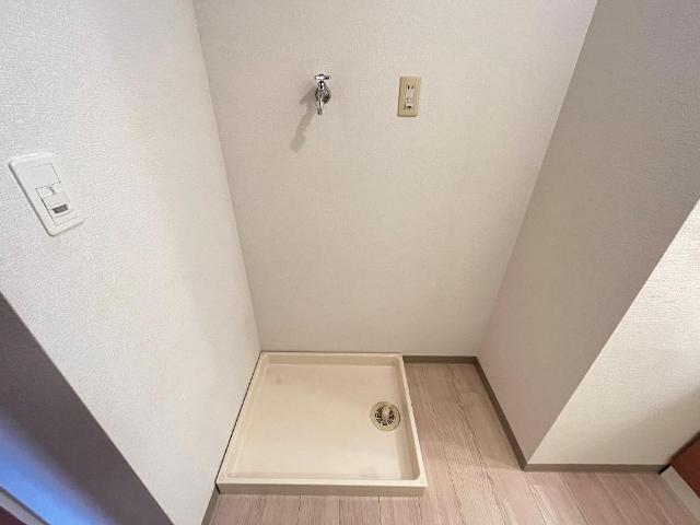 ガーデンヒルズNAKAYAMA弐番館102号室 洗濯機置場