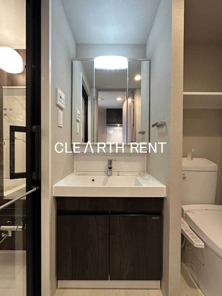 コンシェリア東京 ＜ＨＩＧＡＳＨＩＪＵＪＯ ＲＥＳＩＤＥＮＣＥ13階 人工大理石のカウンター一体型の洗面ボウル