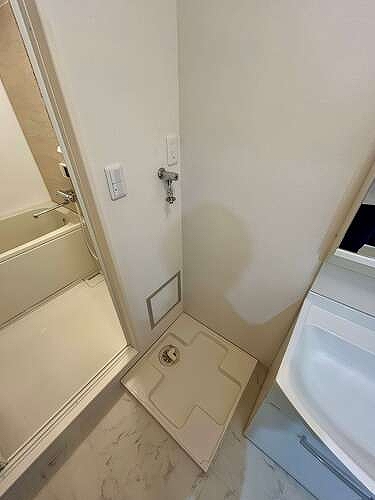 ライオンズガーデン船橋薬園台4階 室内洗濯機置き場