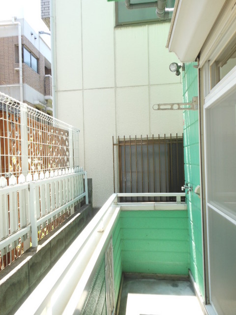 パンプキンハウス0110号室 室外洗濯機置き場