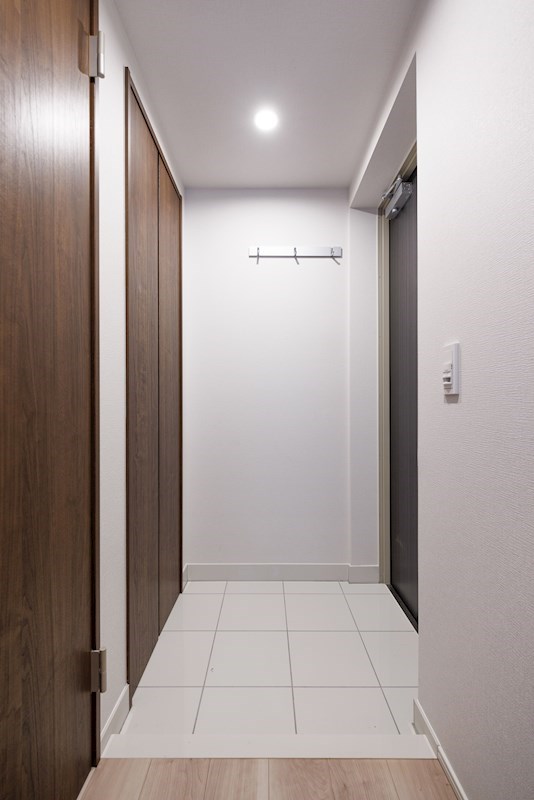 ドゥーエ梅屋敷4階 玄関