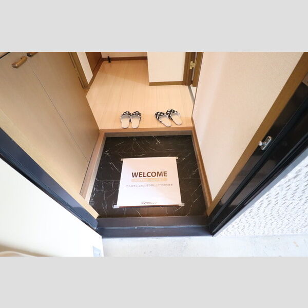 ハイツ・サンピーチ　A 玄関