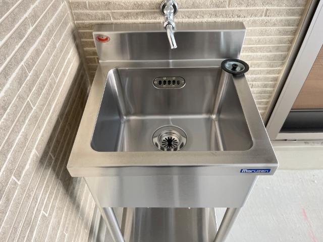 Ｇ・シエルクレール106号室 ガレージ内水洗い場