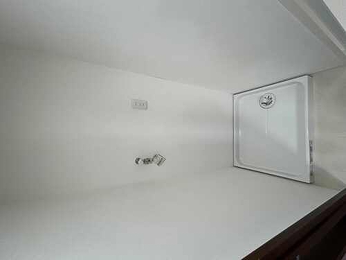 ライオンズヒルズ松戸4階 室内洗濯機置場