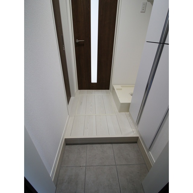 エクセラン東立石 玄関