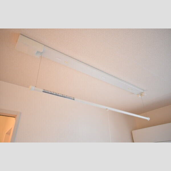 ウィット西高尾202号室 室内物干