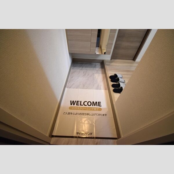 Dスクエア乞田 玄関内