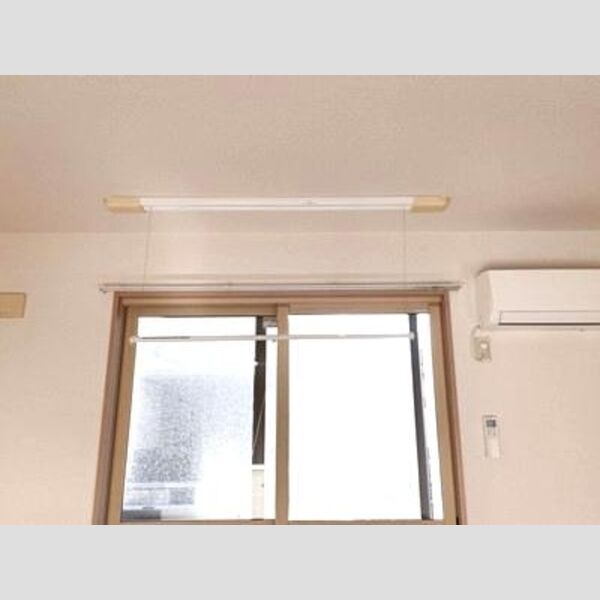 ロジュマン マエバラDEFE202号室 室内物干し