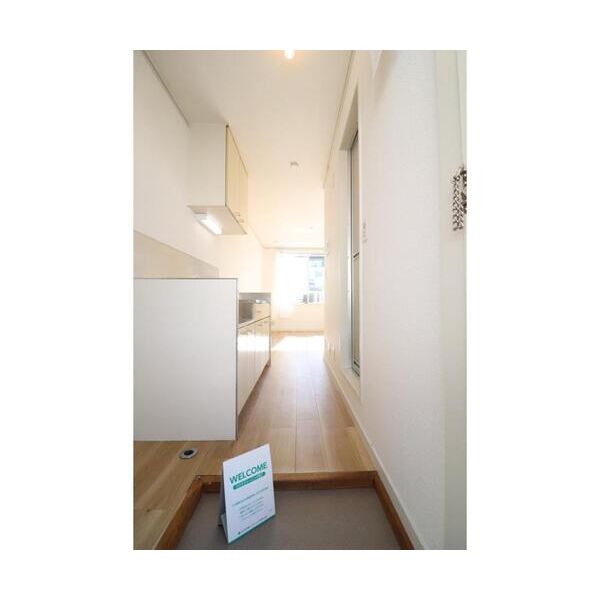 エステートピアカワベ 玄関