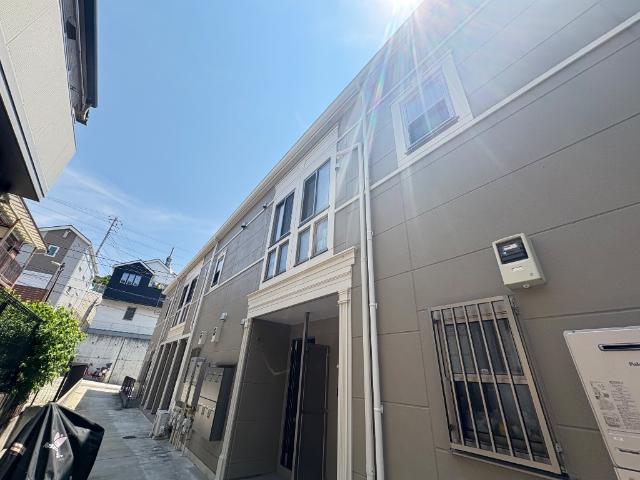 グリーンパーシモン102号室 外観写真（昼）