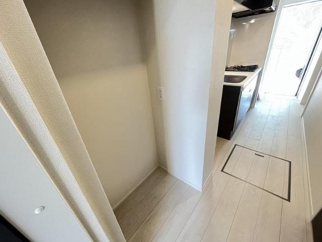メゾンアルス101号室 キッチン用物置スペース