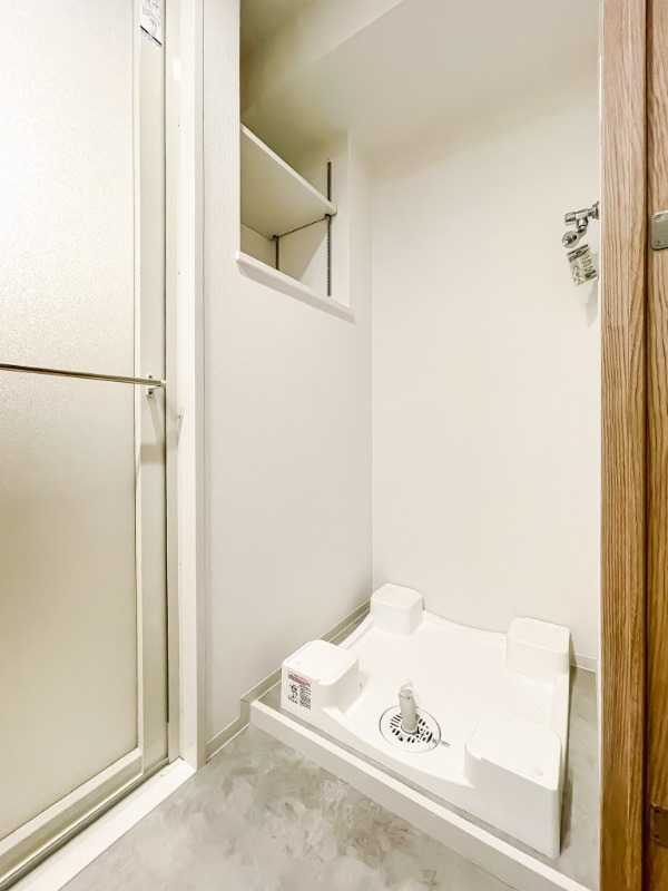 ドゥーエ王子神谷4階 洗濯機置場