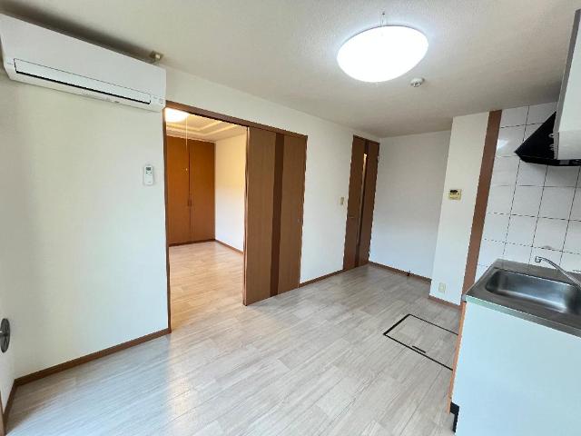 ガーデンヒルズNAKAYAMA弐番館102号室 リビング