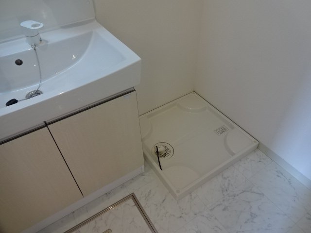 ブラッサムコート101号室 洗濯機置場