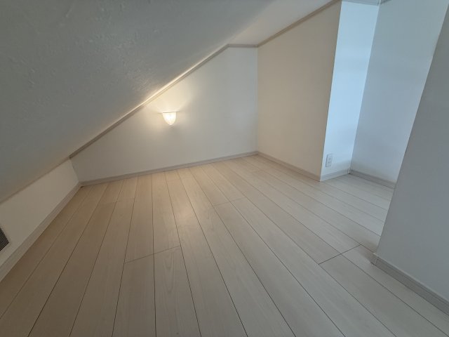 ヒルズ弘明寺202号室 寝室