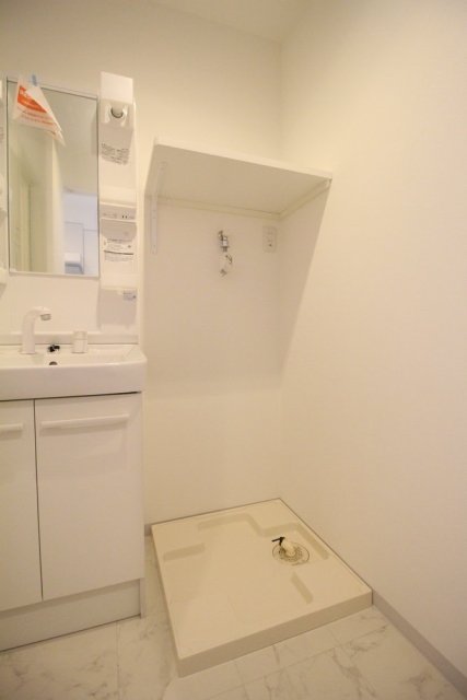 音楽マンション セレナーデ東長崎4階 室内洗濯機置場