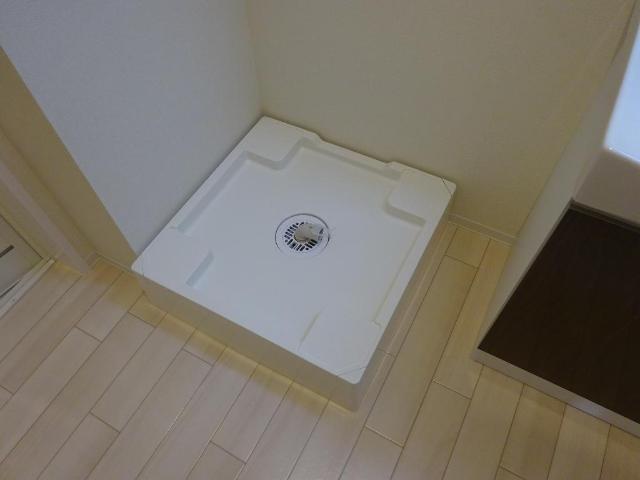 エル・クーレ203号室 洗濯機置場