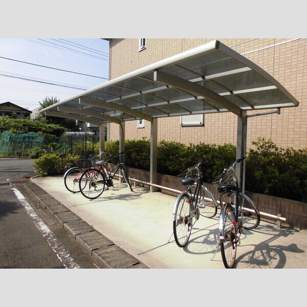 エクセル平山壱・弐番館弐203号室 屋根付き駐輪場