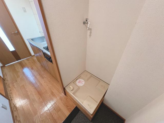 ラ・カーサおゆみⅡ203号室 洗濯機置場