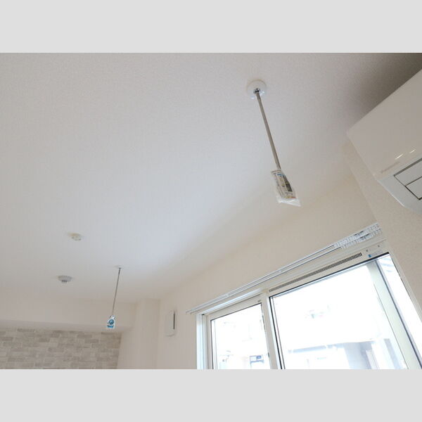 カーサ門源101号室 室内物干し