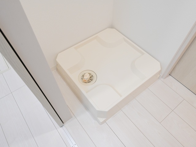 スカイルーチェ川口芝中田103号室 洗濯機置場