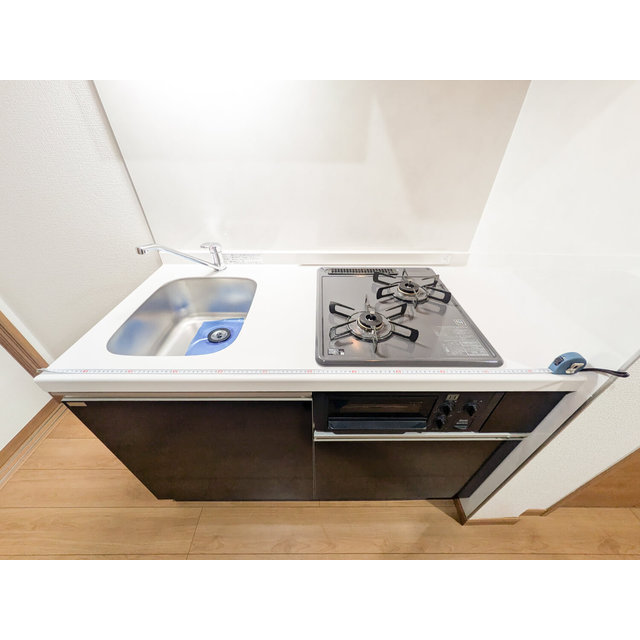 ＧＲＡＮ　ＰＡＳＥＯ舎人0106号室 シンク・コンロ