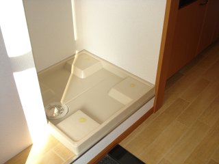 グランモンターニャ103号室 洗濯機置場