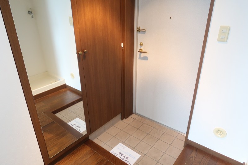 Ｔ’ｓ　ｇａｒｄｅｎ稲城2階 玄関