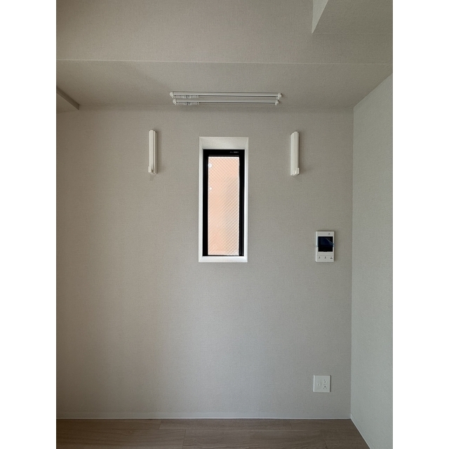 デュオフラッツ品川戸越201号室 洋室　室内物干し　2025年8月撮影