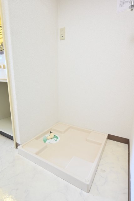 エヴェナール二子新地7階 室内洗濯機置場