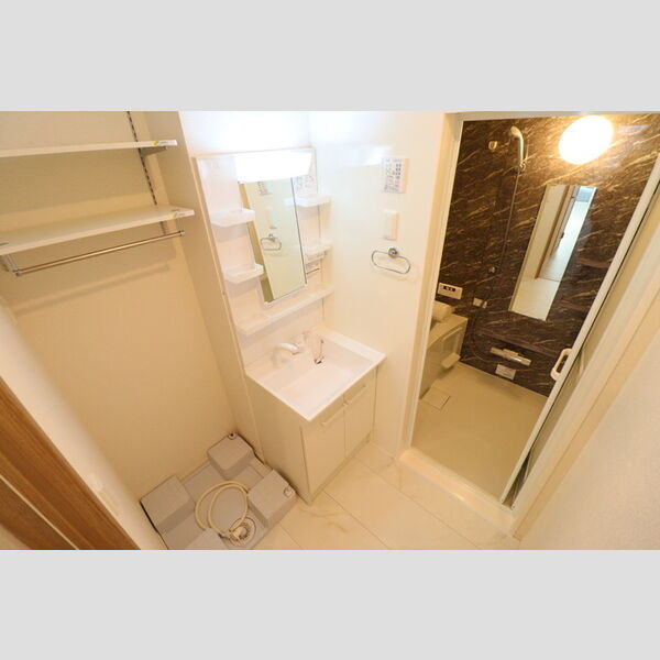 クレールIDAⅢ102号室 洗面脱衣所