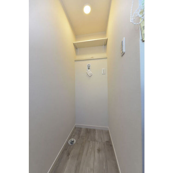 Heim　Komorelia0101号室 洗濯機置場