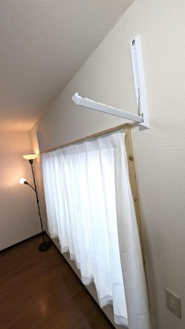 田中ハウス102号室 壁面収納型物干し